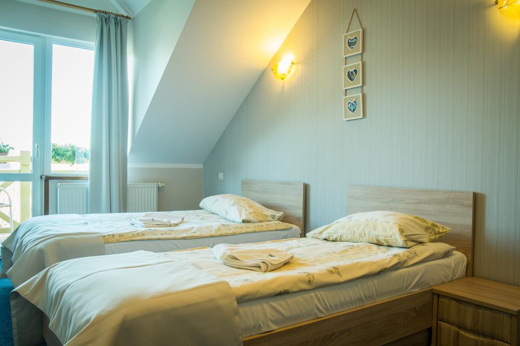Sloneczny Port Bed & Breakfast Mikołajki Oda fotoğraf