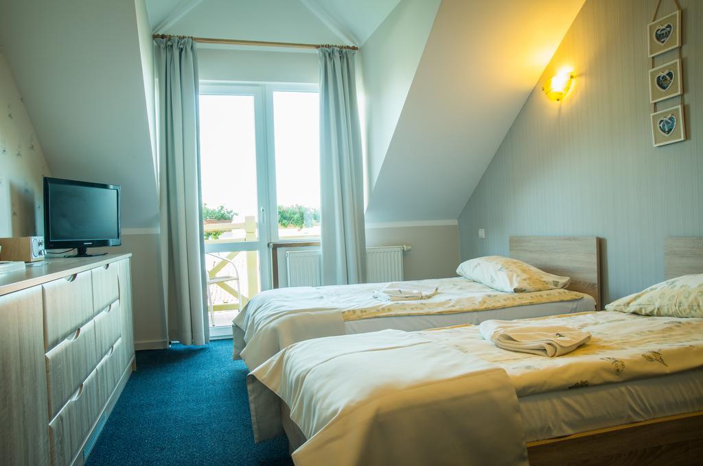 Sloneczny Port Bed & Breakfast Mikołajki Oda fotoğraf